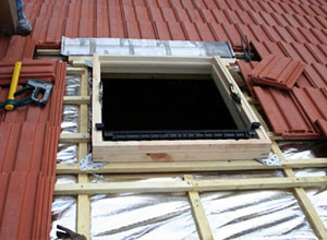 Service pour aménagement de combles par une fenêtre de toit 38